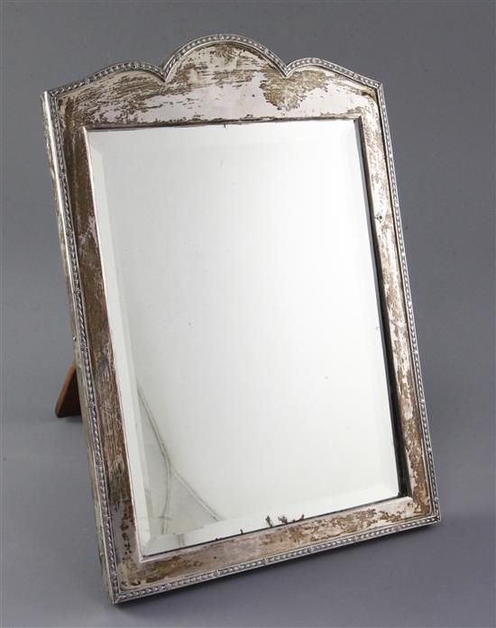 A George V silver mounted rectangular easel mirror by Frederick William Hentsch, 34cm.